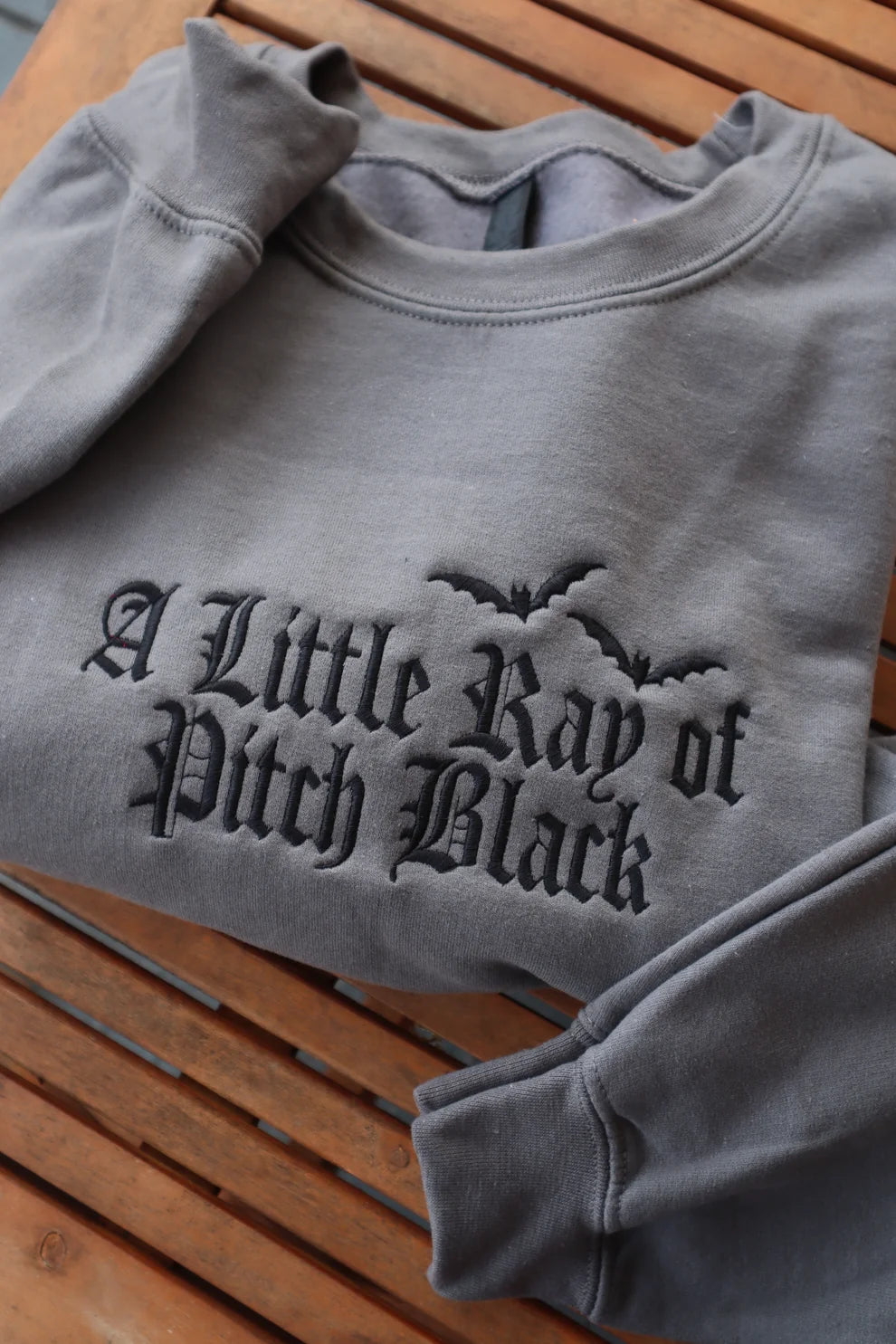 Embroidered A Little Ray Of Pitch Black Crewneck or Hoodie