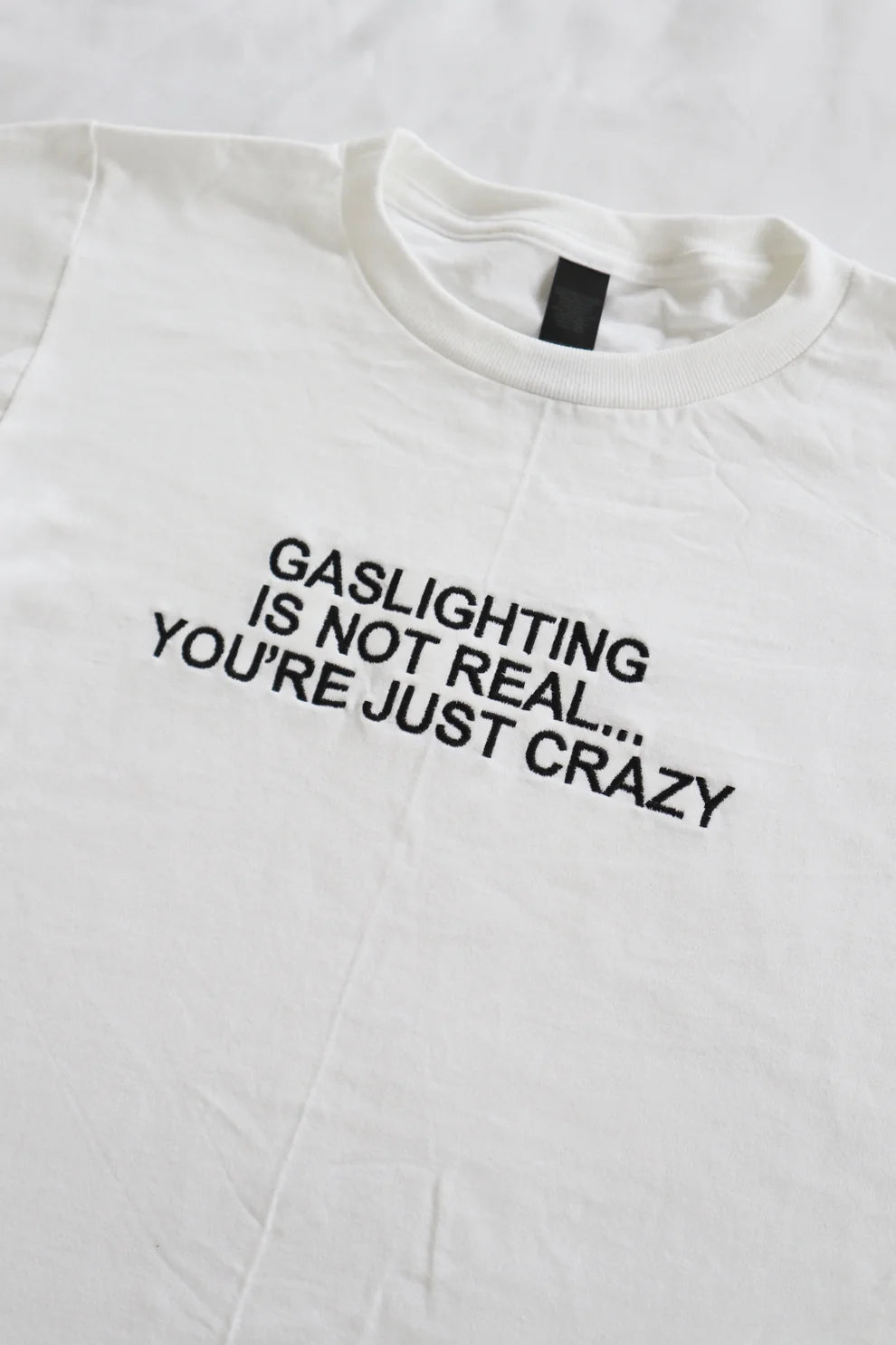 Embroidered Gaslighting's Not Real, You're Just Crazy Baby Tee