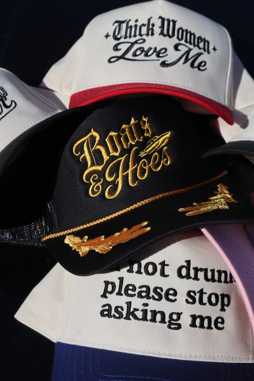 Embroidered Boats and Ho Trucker Hat