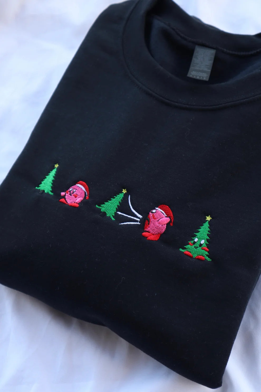 Embroidered Pink Guy Eating Christmas Tree Crewneck or Hoodie